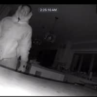 <p>One of the suspects inside the home while the residents sleep.</p>