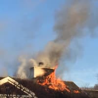 <p>A fire tore through the roof of a Chappaqua mansion over the weekend.</p>