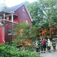 <p>Chiefs Brian Sacher and Jeff Boyle take reports from the crews working the scene.</p>