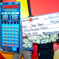Stunned Business Owner Still Shocked At $50K Maryland Lottery Scratch-Off Win
