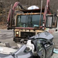 <p>One injured in crash with a garbage truck.</p>
