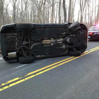 <p>A driver escaped injury on Thursday after a vehicle flipped on its side on Route 136 in Easton.</p>