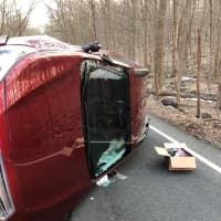 <p>A driver escaped injury on Thursday after a vehicle flipped on its side on Route 136 in Easton.</p>