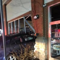 <p>A vehicle crashed into a building after losing control.</p>