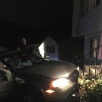 <p>A car crashed into a Hillcrest house, police said.</p>