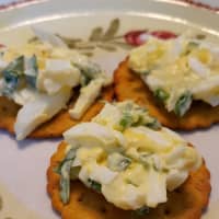 <p>Fresh tarragon chiffonade and chives add some green to this egg salad.</p>