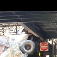 <p>Police said no one was injured when a dump truck crashed through the roof of a North Bergen parking garage Wednesday.</p>
