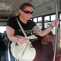 <p>Surveillance footage shows the suspect on a Jitney-style bus.</p>