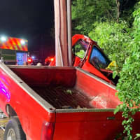 <p>A driver had to be extricated from his truck after crashing into a telephone pole in Trumbull and totaling his car.</p>