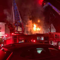 <p>Twelve families were displaced and 10 firefighters were injured in a two-alarm Yonkers fire.</p>