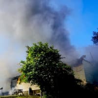 <p>A home received heavy damage from a fire.</p>