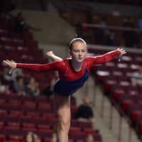 <p>Darien Level 6 gymnast Kerry McDermott was steady through all four events, winning the bars and AA titles for her age group at the YMCA Northeast Regional Gymnastics Championships.</p>