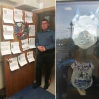 <p>Bogota Police Sgt. Geoffrey Cole with some of the letters of appreciation from Ridgefield Park special needs students.</p>