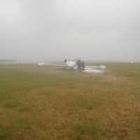<p>The plane skidded off the runway at Newport News/Williamsburg Airport</p>