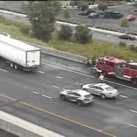 <p>A tractor-trailer sits after jackknifing on I-95 north between Exits 28 and 29, causing a 7-mile backup, on Monday afternoon.</p>