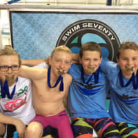 <p>11 12 boys relay record breakers: From left: Emmett Adams, Michael Cowenhoven, Sean Rogers and Rian Hermann</p>