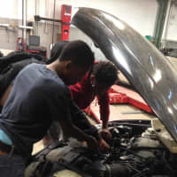 <p>Students in Mount Vernon High School&#x27;s automotive repair program.</p>