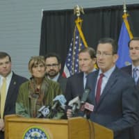 <p>Gov. Dannel Malloy announces federal funding for Connecticut as state Rep. Steve Stafstrom (far left), U.S. Sens. Richard Blumenthal (center) and Jim Himes (far right) and others look on.</p>