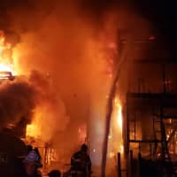 <p>Four buildings were destroyed during a fast-moving three-alarm fire.</p>