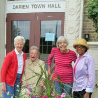 <p>Darien Beautification Committee planted flowers downtown, outside of town hall.</p>