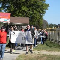 <p>The American Foundation for Suicide Prevention&#x27;s annual &quot;Out of Darkness&quot; walk in Mamaroneck Oct. 15 aims to prevent suicide and to open up discussions on the sensitive subject. Shown are participants during its 2014 event.</p>