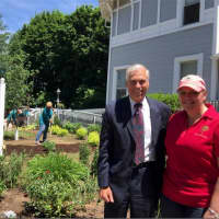<p>Valley Community Foundation Board Chair Alan Tyma and Adam&#x27;s House Founder Allison Wysota in front of newly planted garden.</p>