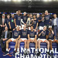 <p>Iona Prep graduate Ty Jerome and the Virginia Cavaliers cut down the nets at the NCAA Tournament.</p>