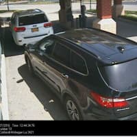 <p>The suspect wanted for trying to cash a stolen check was also driving a black Santa Fe (pictured) with stolen tags.</p>