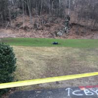<p>State and local police are investigating the discovery Wednesday of an ATM behind an office/industrial complex in Southbury.</p>