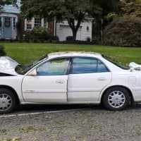 <p>The four-door Buick sedan crashed on North Monroe Street.</p>