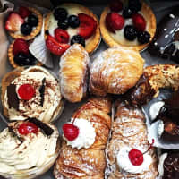 <p>A wide array of sweets is available in the bakery cases.</p>