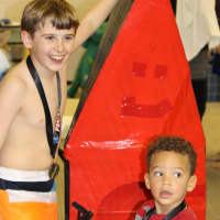 <p>Aiden Grant and his HMS Sinksalotnot was named &quot;overall winner&quot; of Friday&#x27;s 4th annual Cardboard Boat Regatta at the Rye YMCA.</p>