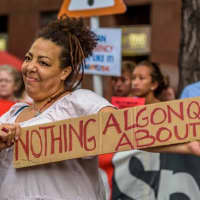<p>Rachel Marco-Havens of Woodstock makes no bones about her feelings about the Algonquin gas pipeline project at a protest in Manhattan Thursday.</p>