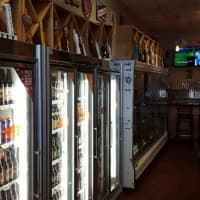 <p>A peek at the beers being offered at Amazing Grapes in Pompton Lakes.</p>