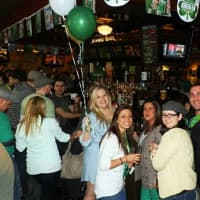 <p>An array of patrons celebrate St. Patrick&#x27;s Day with Thatcher McGhee&#x27;s Irish Pub in 2013.</p>
