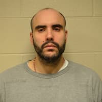 <p>Ricardo Andre was arrested Thursday by Connecticut State Police on charges of first-degree manslaughter in a fatal car crash.</p>