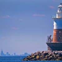 <p>Norwalk’s Greens Ledge Lighthouse, with Manhattan on the distance horizon, is one of the targets for The Maritime Aquarium at Norwalk’s new Maritime Aquarium Lighthouse Cruise on Sat., Nov. 7.</p>