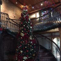 <p>A towering Christmas tree graces Dramatic Hall at the Peekskil Central Market on Main Street.</p>
