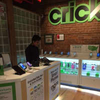 <p>Nelson Sanchez mans the Cricket store at the Peekskill Central Market on Main Street.</p>