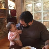 <p>Gabriel Arango Jr. and his baby daughter, Nora, enjoy bagels and cream cheese at his new cafe, Kurzhal&#x27;s Coffee, on Peekskill&#x27;s Main Street.</p>