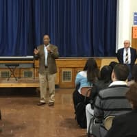 <p>Englewood on the Palisades Charter School hear from Assemblyman Gordon Johnson at a school assembly. </p>
