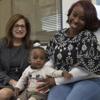 <p>Sharon Goldstein, Campus Operating Officer, Berkeley College Online® sits and chats with student-veteran Shantol Coleman, a new mom who is earning her degree in health services management and is on track to graduate in August 2018.</p>