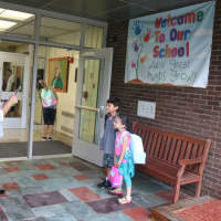 <p>Students in Lakeland get ready to head into the building for the first time.</p>