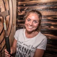 <p>Axes and ale are offered at Bad Axe Throwing opening soon in Westchester.</p>