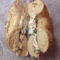 <p>Bagel Crossing&#x27;s &quot;everything&quot; bagel with scallion-bacon cream cheese is a customer fave.</p>