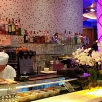 <p>A sushi chef prepares food at Baumgart&#x27;s Cafe in Edgewater. The kid-friendly, pan-Asian meets American diner eatery, also has locations in Englewood and Ridgewood.</p>