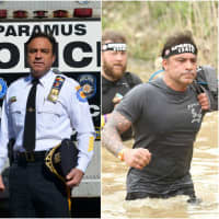 <p>Deputy Chief Guidetti treads through muddy waters during a Spartan Race.</p>