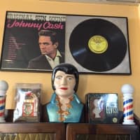 <p>The decor at the Beale Street Barber Shop in Peekskill reflects owner Mark Sinnis&#x27; two passions, music and cutting hair.</p>