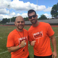 <p>Hasbrouck Heights coach Adam Baeira (left) teamed up with the Anti Bully Squad, co-created by Denver Bronco Brandon McManus (right)</p>