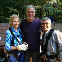 <p>Barbara Stetson, Stephen Stout (Trinity Outreach Committee) and Bahman Azarm at The Adventure Park before Barbara&#x27;s climb. </p>